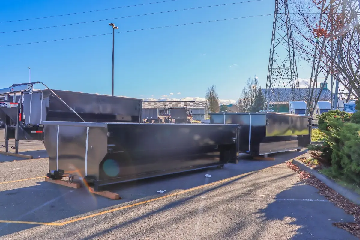 Roll-off dumpster ready for waste disposal at job site for Roll Off Dumpster Rental in Milton
